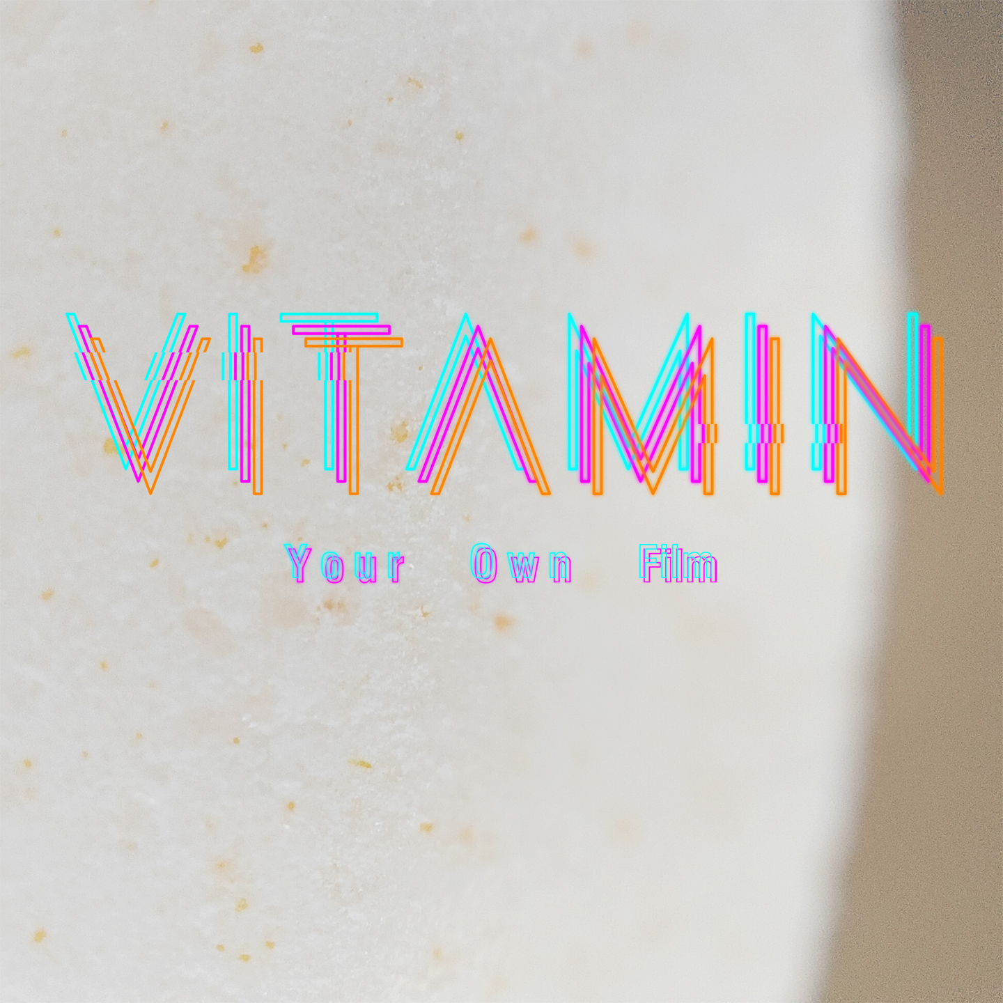 Pochette de l'album Vitamin de Your Own Film, avec le titre en effet chromatique sur fond clair texturé