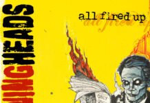 Burning Heads : All Fired Up, un brasier punk rock à rallumer Pochette de l'album All Fired Up des Burning Heads, avec un homme illustré en train de lire un journal enflammé