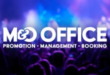 M&O Office met en avant ses nouvelles sorties metal et rock Bannière M&O Office sur fond de concert, lumières bleues et public en silhouette