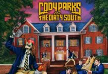 Cody Parks and The Dirty South dévoile le single et clip « Hairy Buffalo » Pochette du single Hairy Buffalo de Cody Parks and The Dirty South, avec une maison en briques et des étudiants autour d'un tonneau de bière